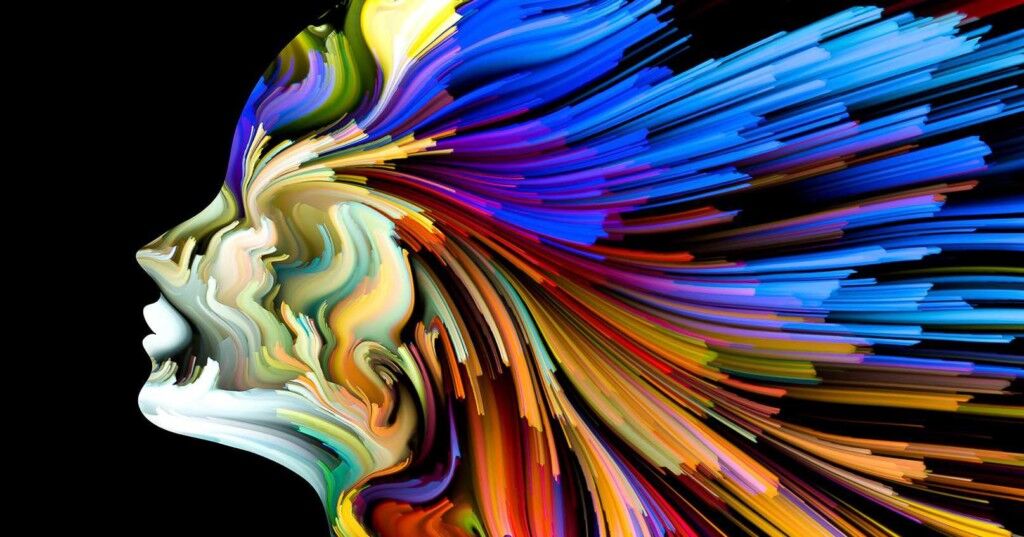 multi-coloured graphic image of woman's head LED radiance digital projection 8K laser projector