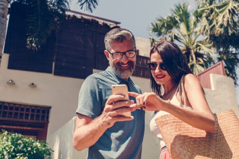 man and woman using app