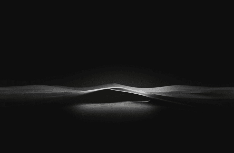 Black background with silver graphic smokey effect layered on top