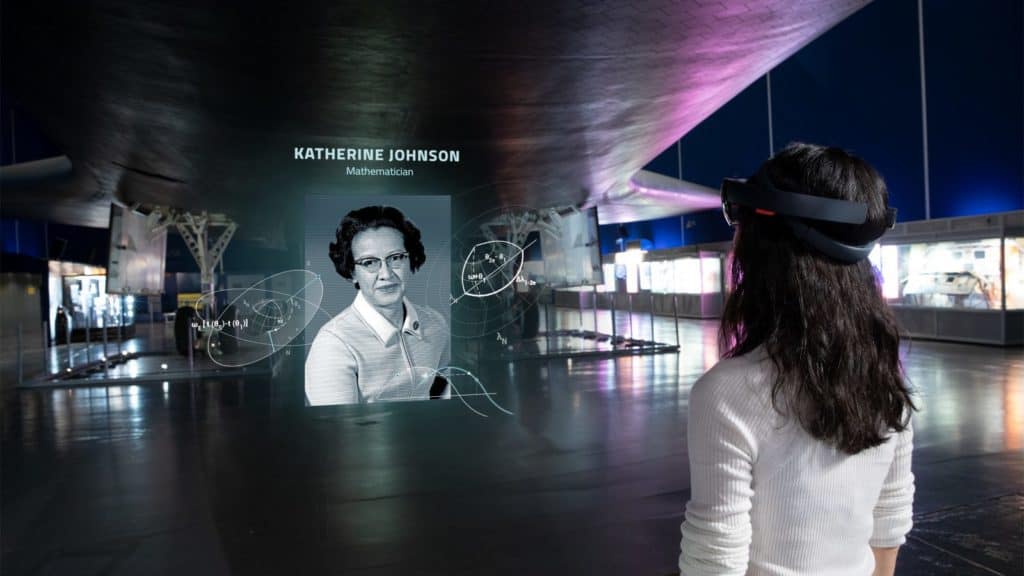 Museum visitor seeing AR information using Microsoft's HoloLens