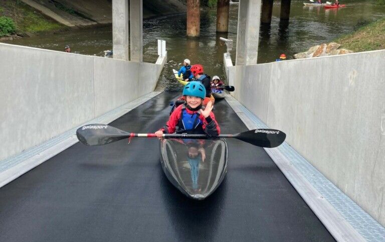 Sunkid water conveyor belt for Olympic training facility